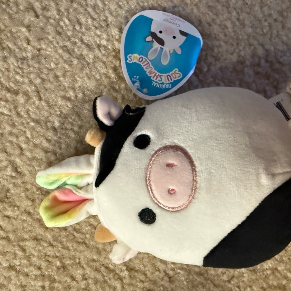 Squishmallow Conner the Cow with bunny ears